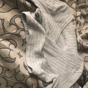 small gray crop top with sleeves